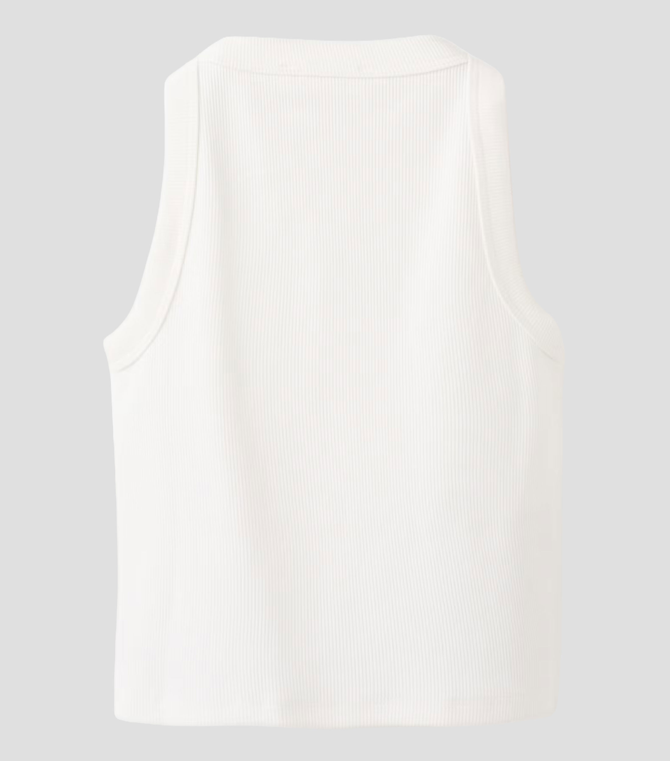 Playera cuello redondo sin mangas lisa Niña